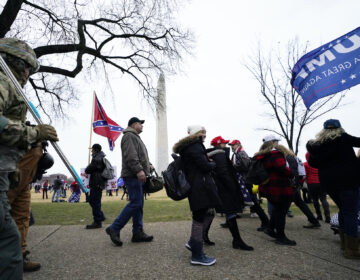 In this Jan. 6, 2021, file photo, Trump supporters gather on the Washington Monument grounds in advance of a rally in Washington. (AP Photo/Julio Cortez)